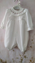 In25-22 Romper with smocking COLLAR and babys name embroidered IN CUFFIN